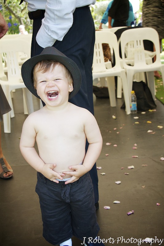 Laughing toddler at garden wedding - wedding photography sydney